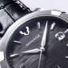minase collection uruga black dial and stainless steel close up